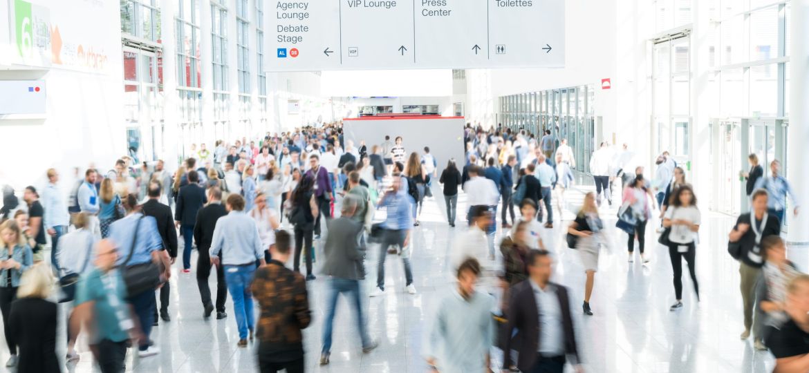 blurred business people at a trade fair